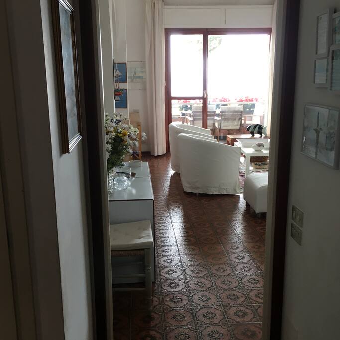 The light coming from the balcony window welcomes you in your new temporary home.