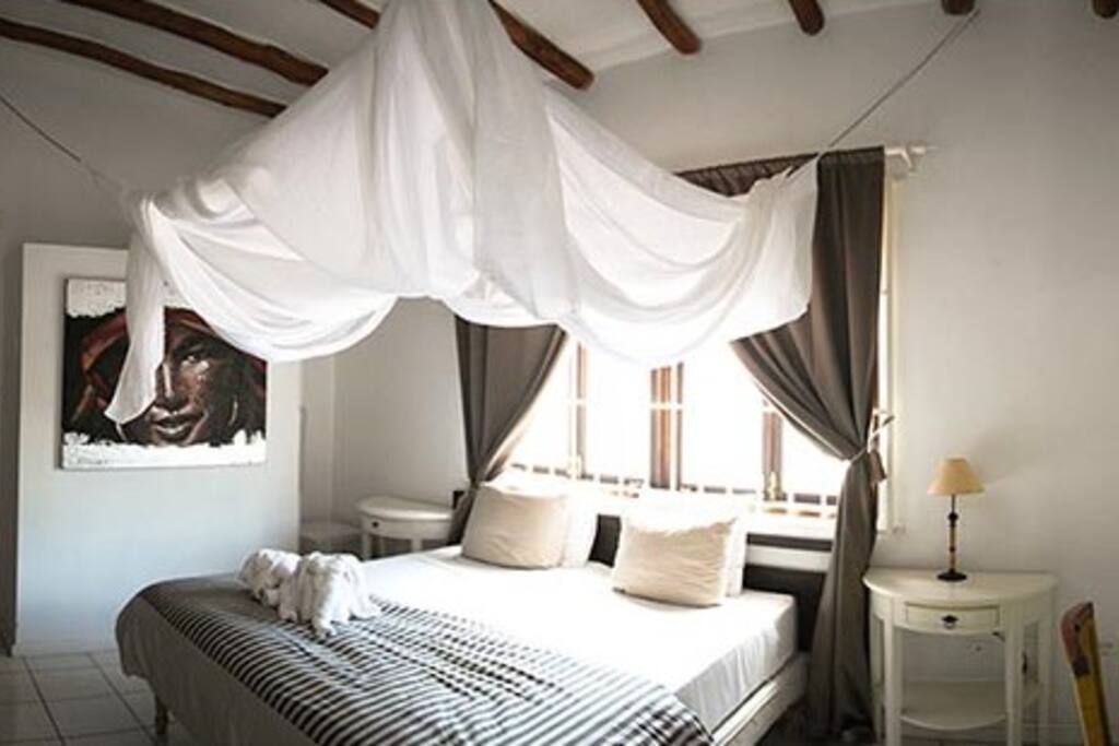 The master bedroom comes with a queen size bed