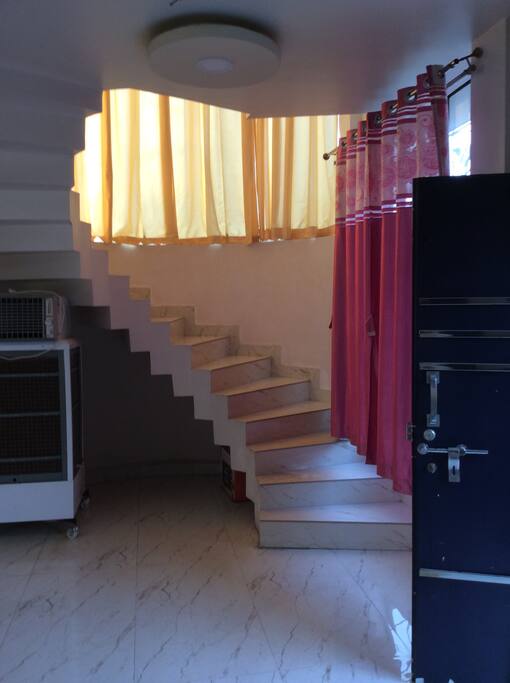 Stairs to to upstairs to the floor