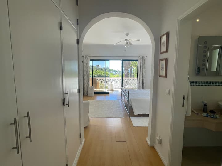 Archway to master bedroom, en suite on right 