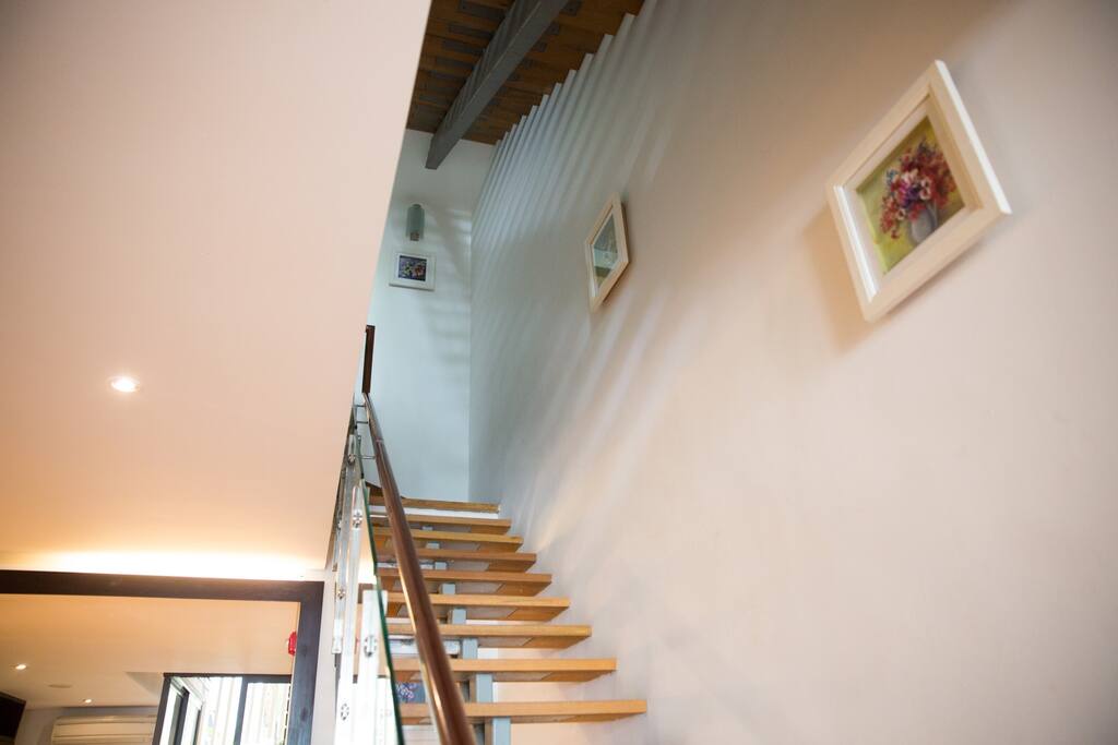 Entrance from the ground floor leading up to the upper floors, the Summer Room is on the 3rd floor full of sunlight and greenery through the windows