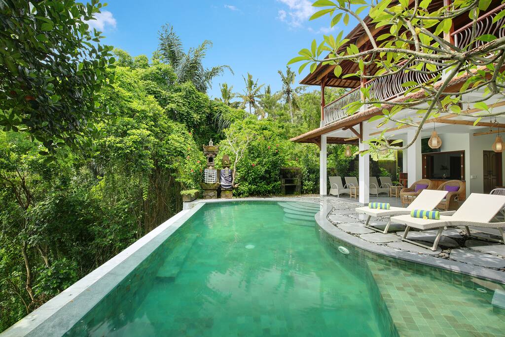 Swimming Pool with river view and sitting area