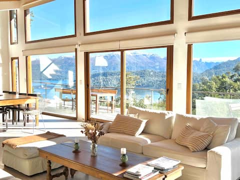 Modern house with spectacular lake and forest views