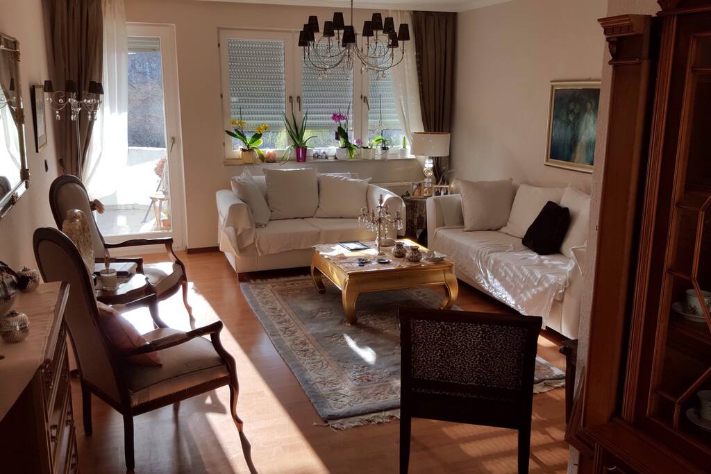 This is my living room with an access to a balkony for those who smoke.