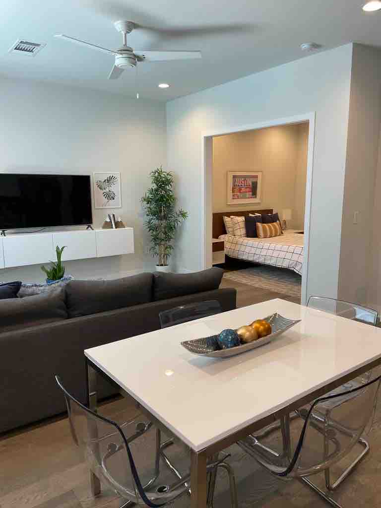 Downtown Oasis: Work, Pool, Gym and EV Park