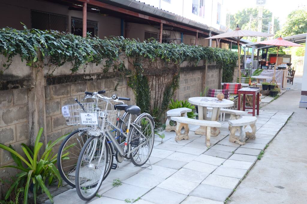 Have a seat, relax and eat in front of the building.