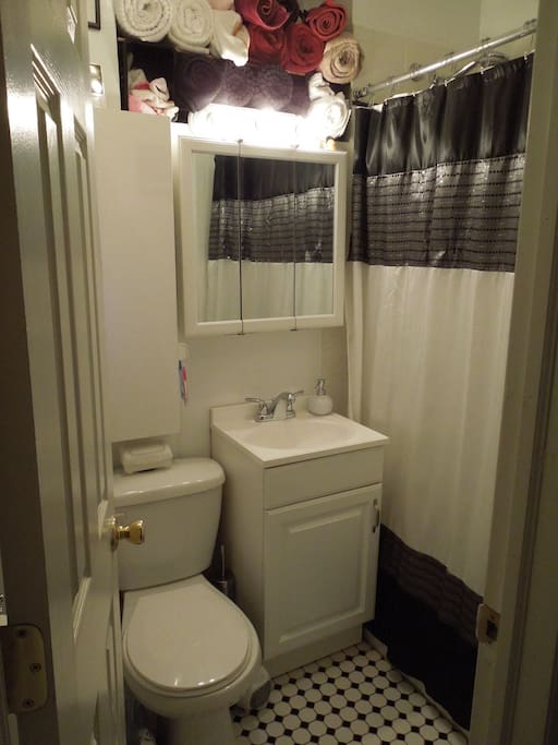 Upstairs bathroom with tub.