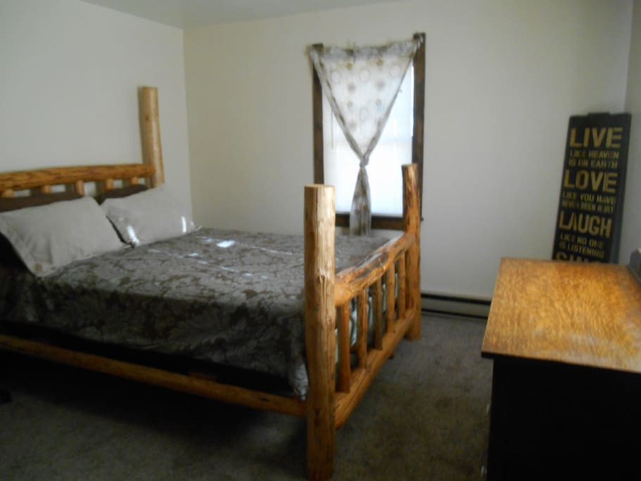 Queen size handcrafted log bed
