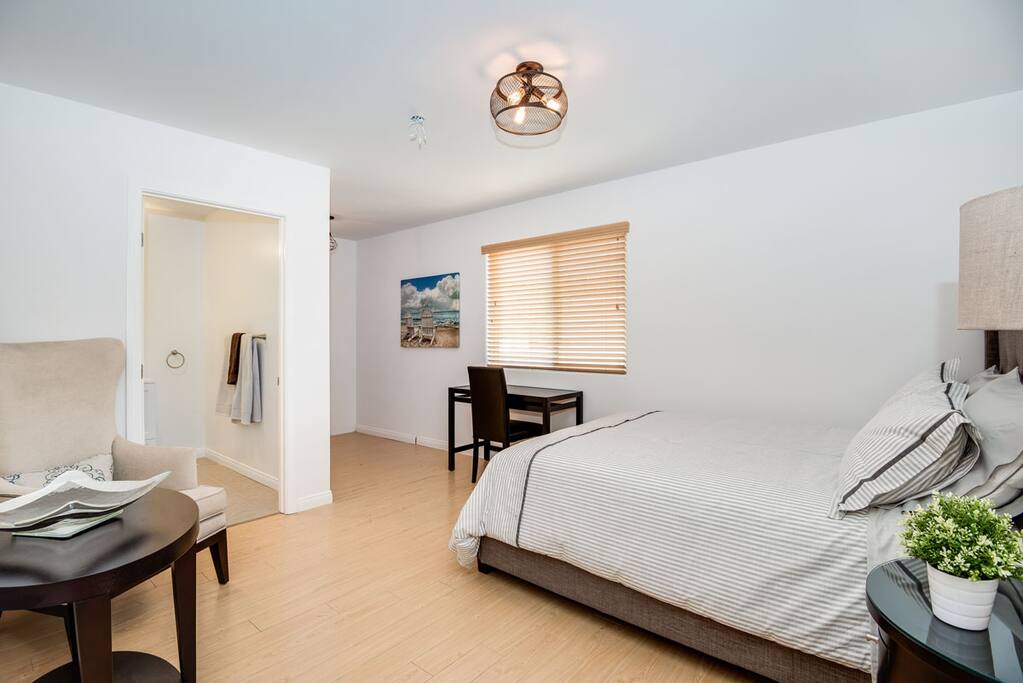 Bedroom with Queen bed, Desk/Chair, Sitting area and Closet