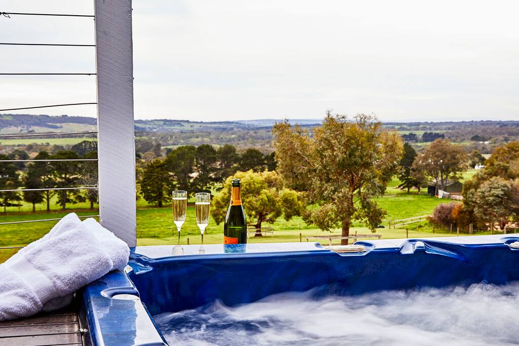 Relax in your private spa and enjoy the views.