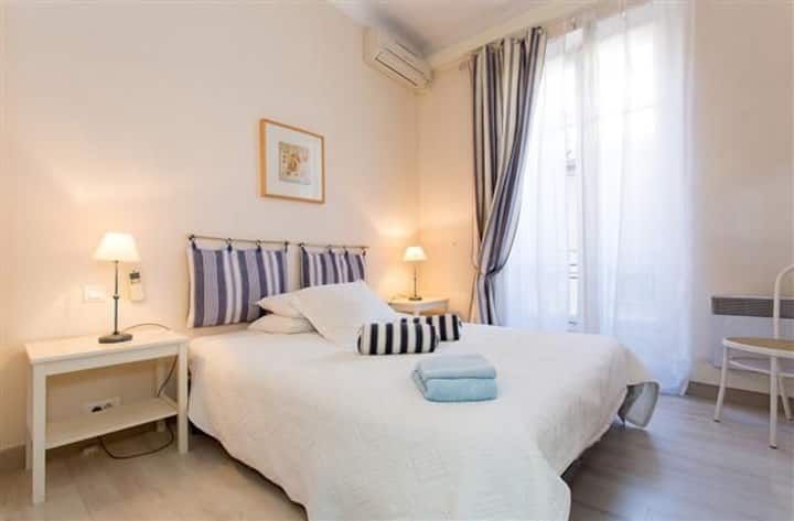 Bedroom  1       This king sized bed can be made into two singles.   Relaxing colours in our quiet bedrooms - all on courtyard side of the apartment!