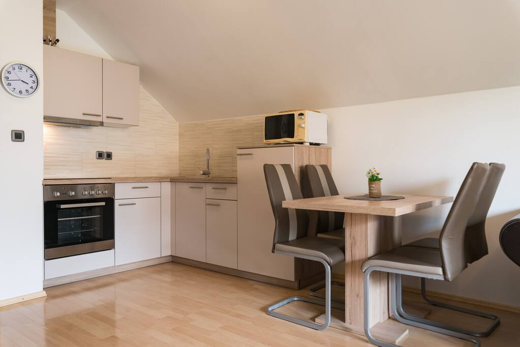 Jezerci Apartments - dining area and kitchen