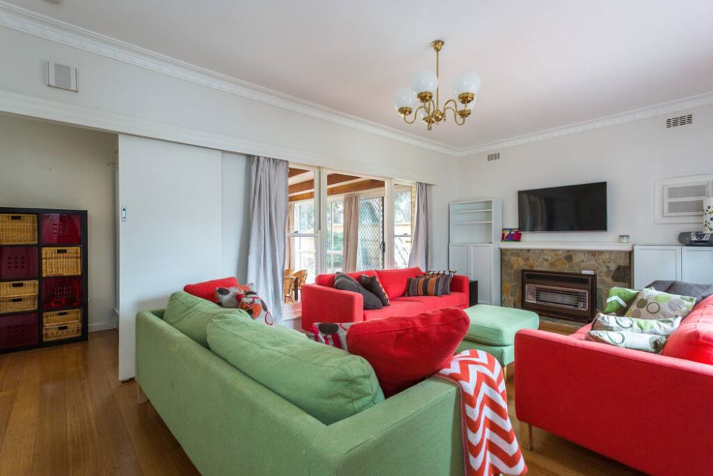 Cozy living room with TV air con and heating