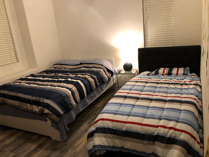 Quiet Bedroom with private fridge microwave and TV