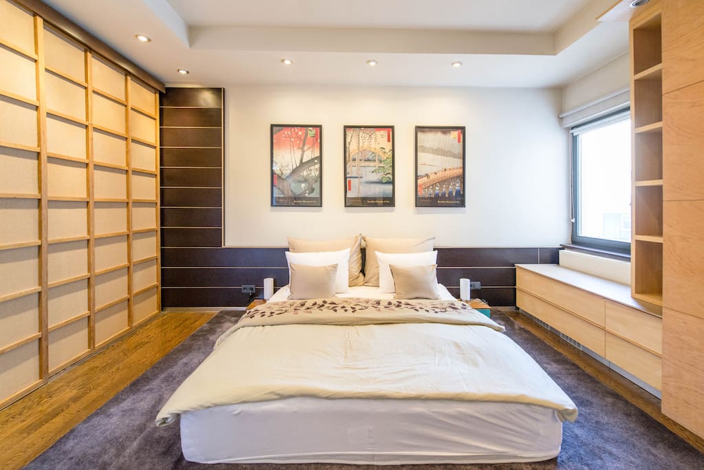 Asian-design inspired bedroom with king sized mattress and luxurious Marriot mattress topper