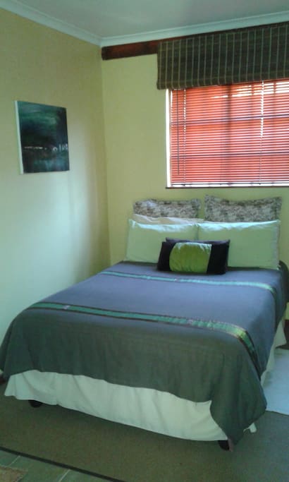 Comfortable double bed with fresh linen and extra blankets