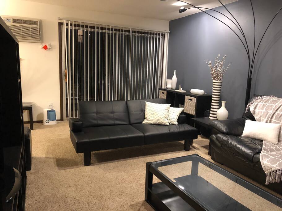 Living room: TV, sofa bed, couch, air conditioning, workspace