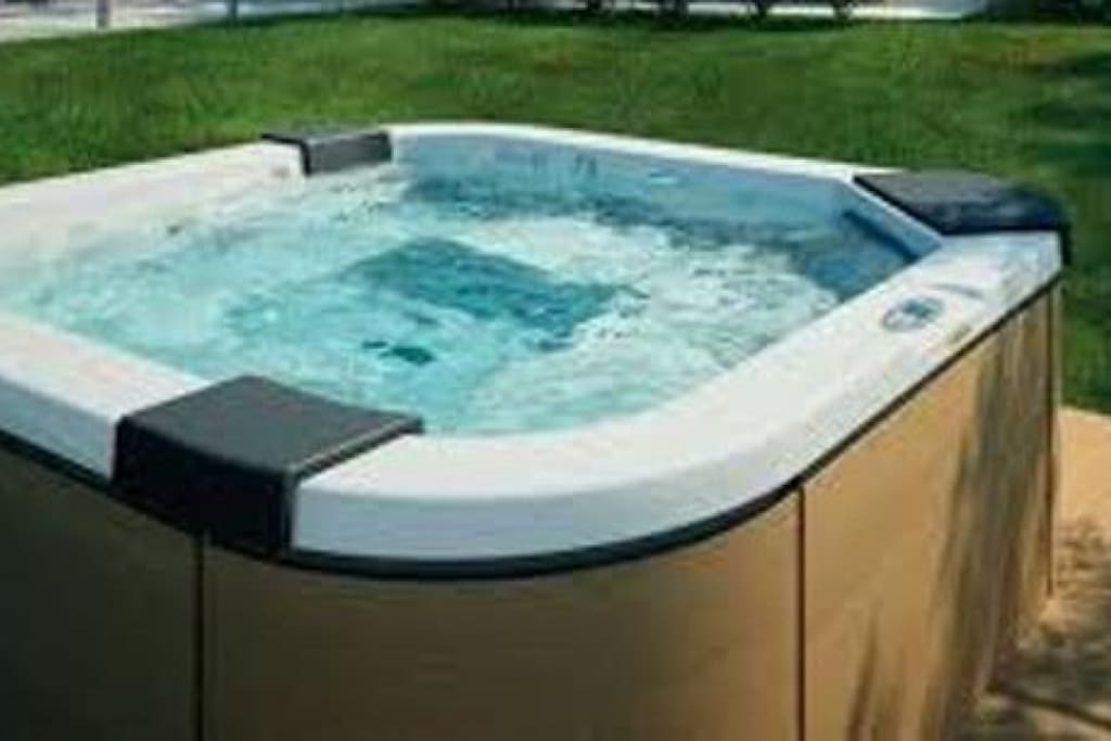 Private whirlpool bathtub.