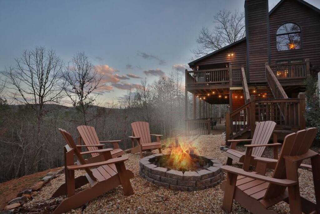 Custom fire pit area adjacent to house