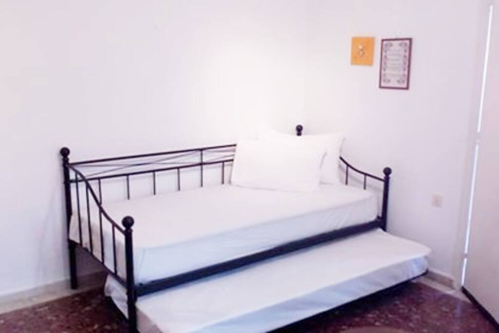 the 2nd bedroom with new sofa bought at November 2018 that make king size double bed, 190x175, or 2 separate single beds with new reading lamps. All sheets are new bought at June 2018.