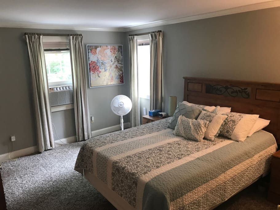 Second bedroom with queen size bed access to second floor master bath