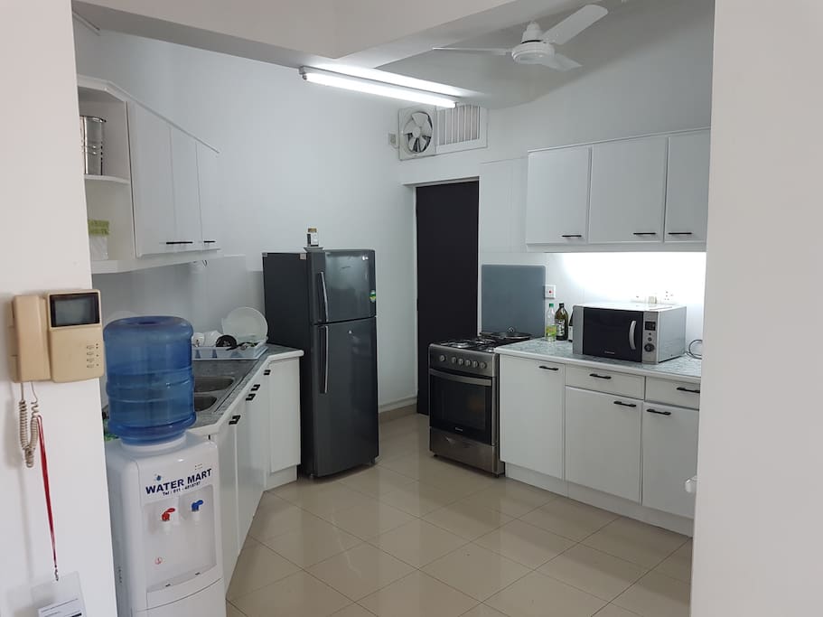 Kitchen with drinking water, refrigerator