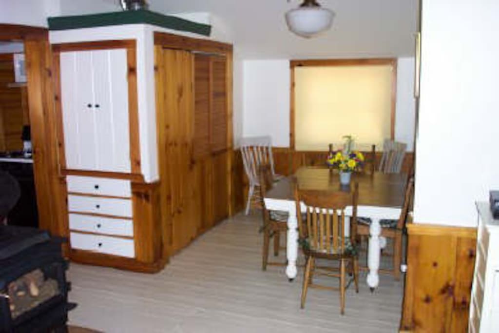 dining room with laundry behind doors