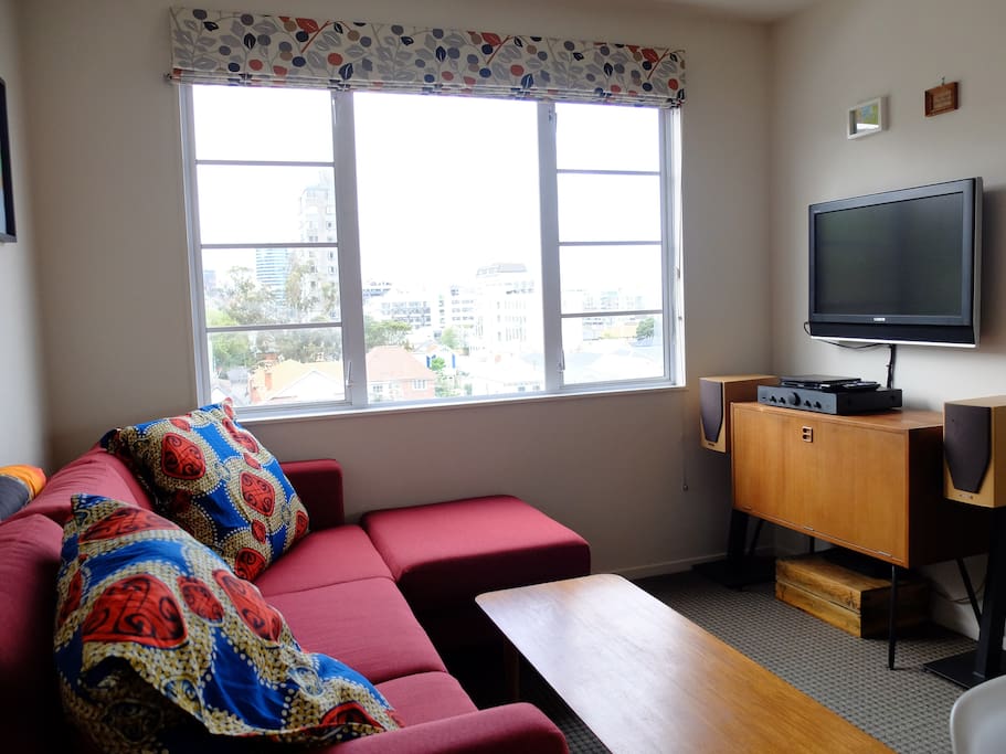 Lounge and TV area, comfortably sits two, or enough for two people to lie down