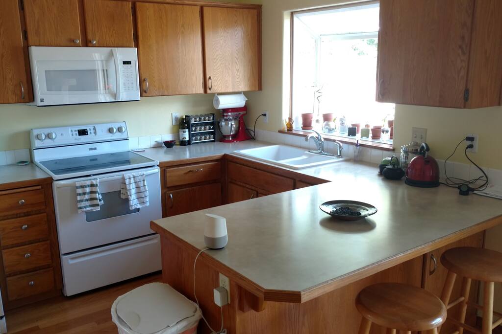This is our kitchen. Help yourself to tea or coffee.
