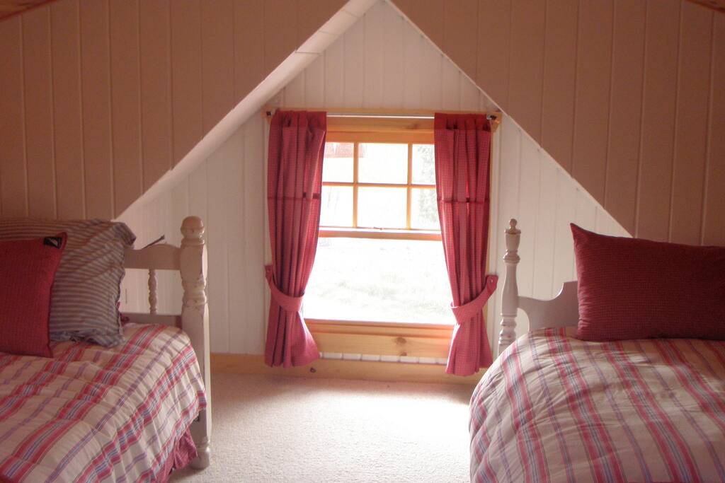 Upstairs beds in the little cabin