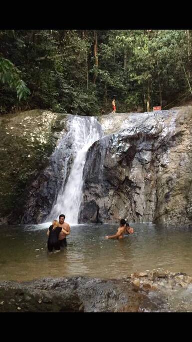 Public waterfall besides resort