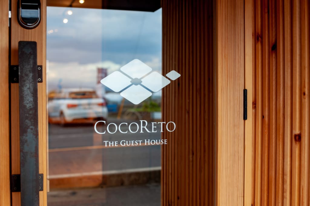 COCORETO The Guest House' entrance, with logo mark.