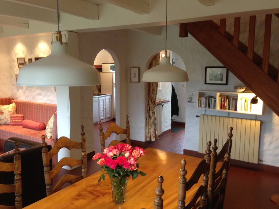 New light fixtures above the dining room table.