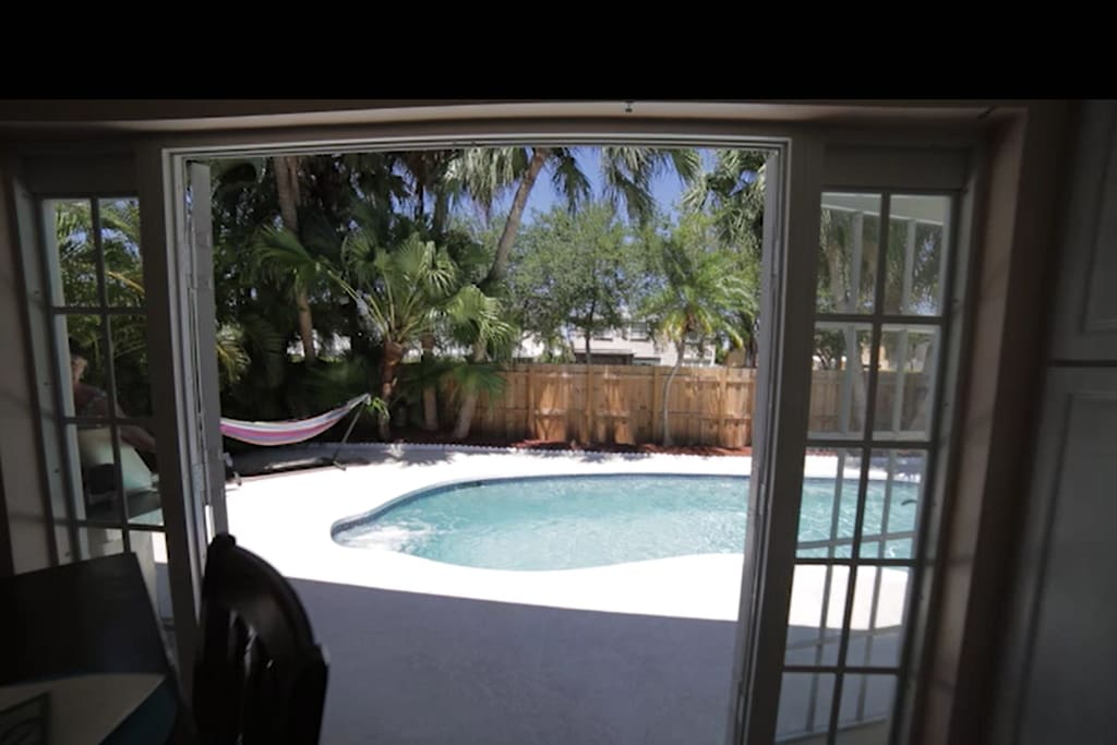 French door open to the pool