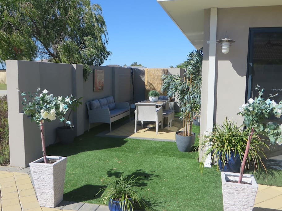 Courtyard and BBQ area beside front door and overlooked from lounge/dining