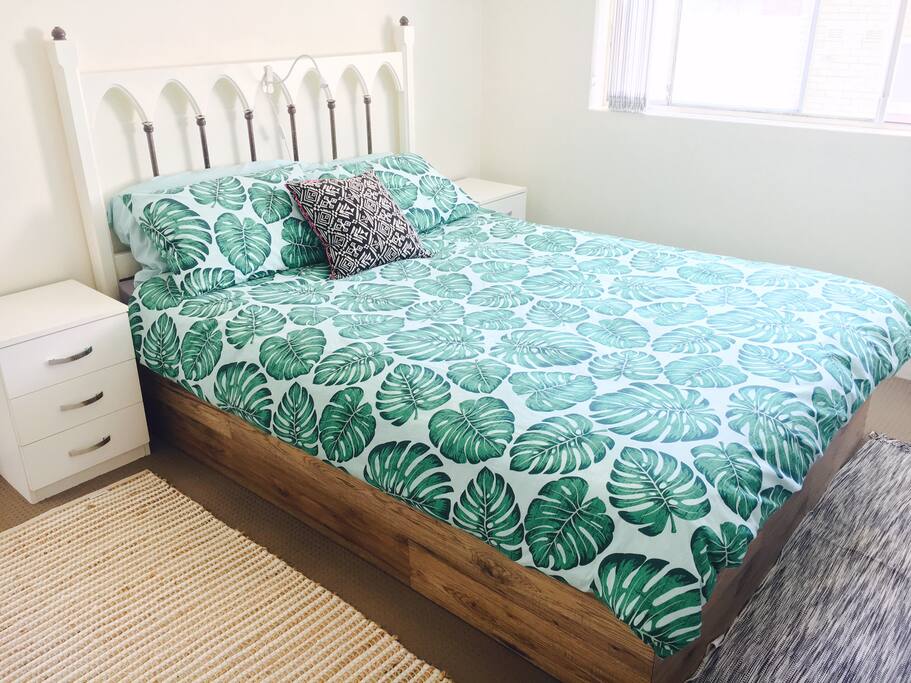 Master bedroom Queen bed and TV