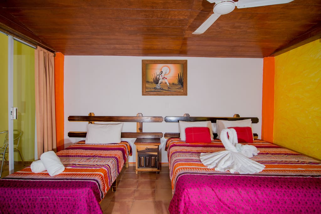 1 double and 1 single bed, a/c, calbe tv, ceiling fan, wifi