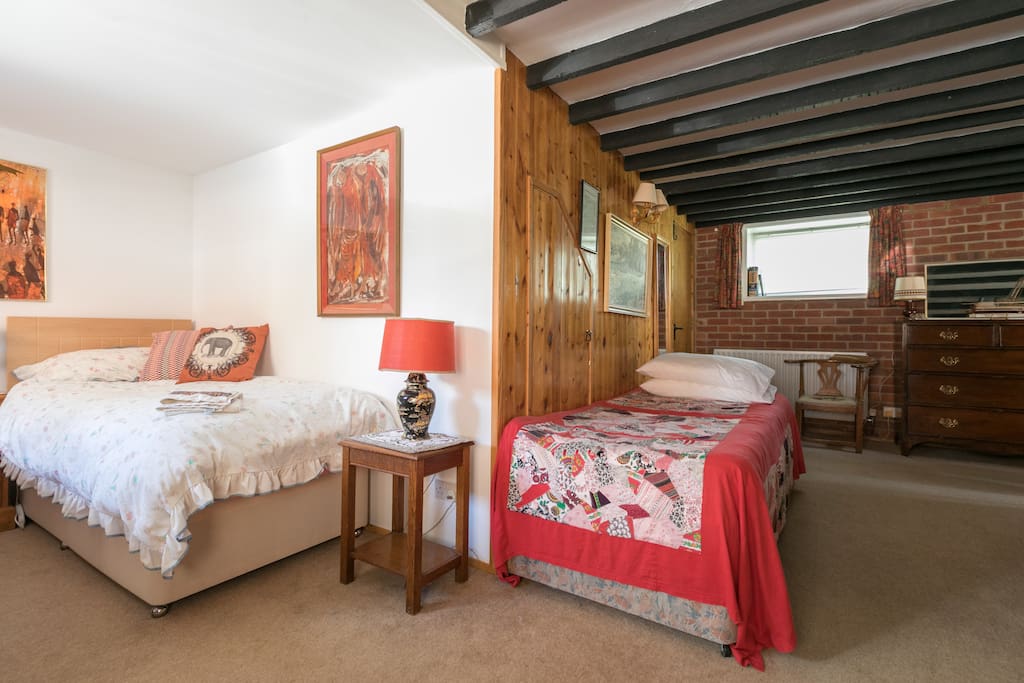 On the right is the third bed in the L-shaped bedroom.