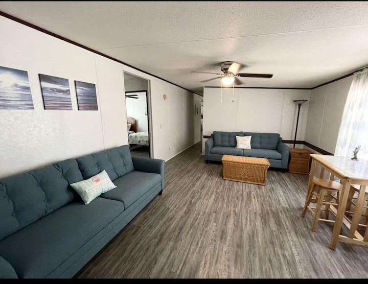 ALL HANDS ON DECK!!  This large family room boasts 2 large Queen size sleeper sofas that round out the sleeping space for 10!   We have added Toppers to make these even more comfy.  This room also features a 2nd TV with Roku & Dish Network Top 120! 
