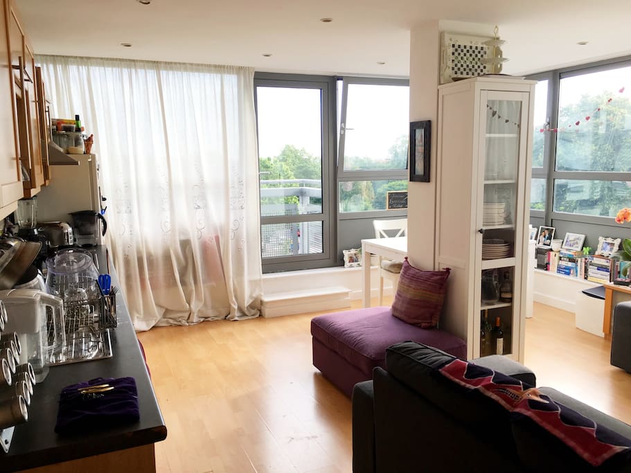 The door leads to a balcony overlooking all of London from the South perspective. Balcony is perfect for smokers since smoking isn't allowed inside the flat.