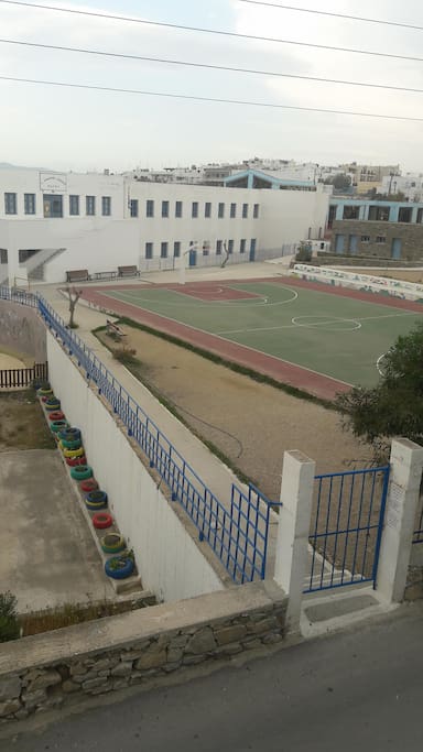 open court for basketball near to the house