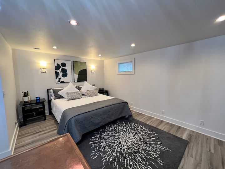 Bedroom area with California king mattress.