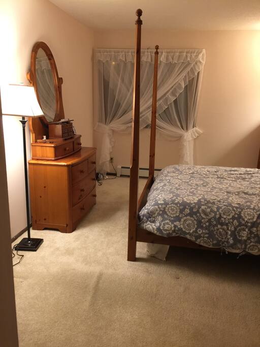 Warm and cozy queen size bed with lots of floor space