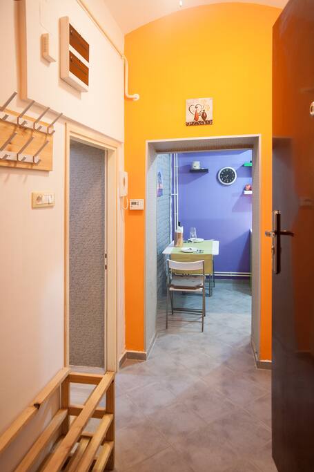 The main hallway leading to the kitchen and dining area.