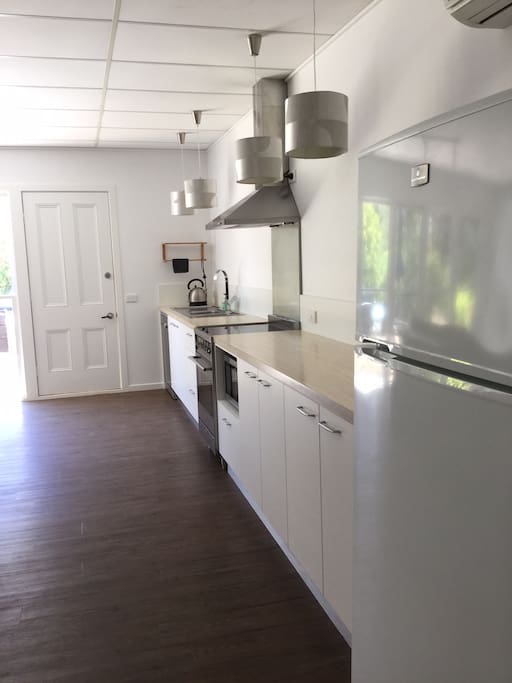 Gorgeous fully equipped modern kitchen with microwave AND dishwasher.