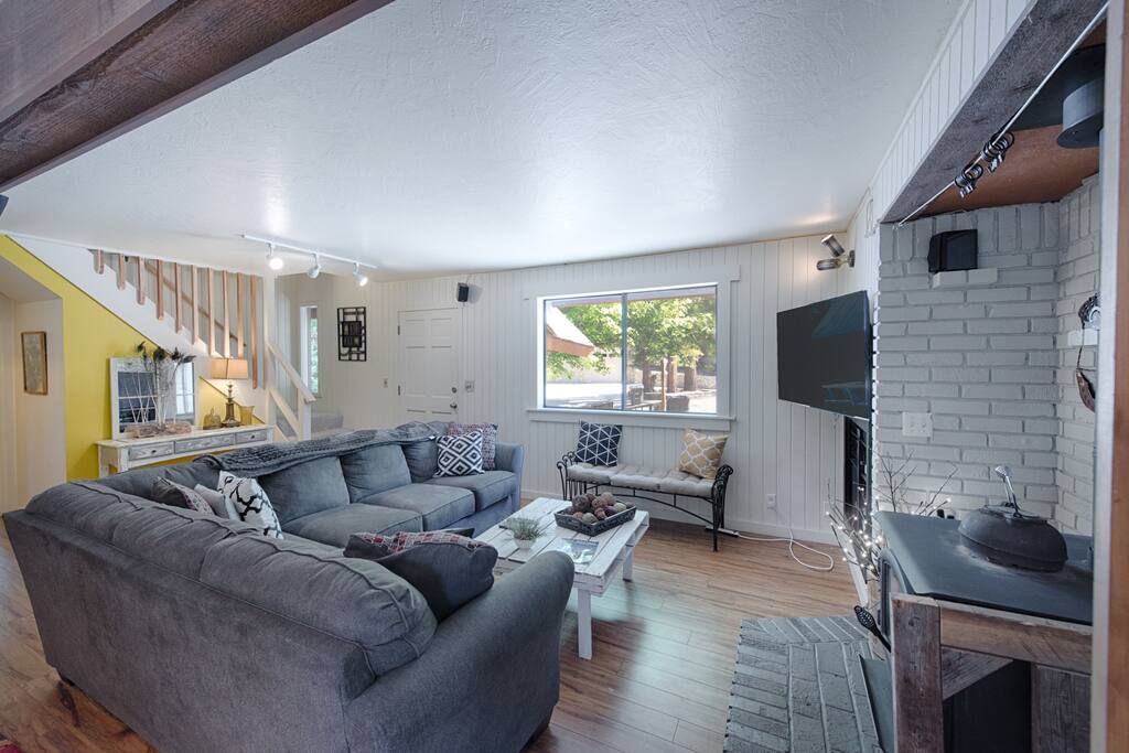 Large couch in great room makes for fun games, video, reading, resting and watching the fire.