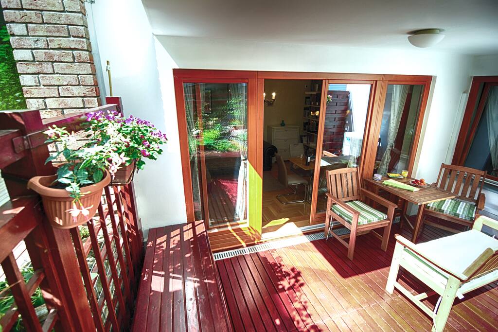 the terrace with door which can be opened separating the living room