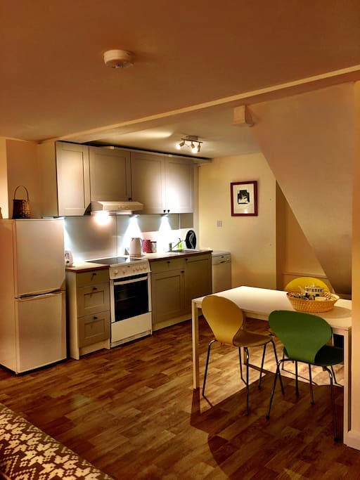 Kitchen and dining area. Kitchen includes fridge freezer, cooker, dishwasher and all usual amenities.