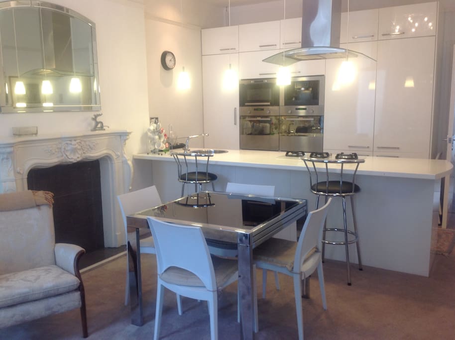 dining area with fully equipped kitchen
