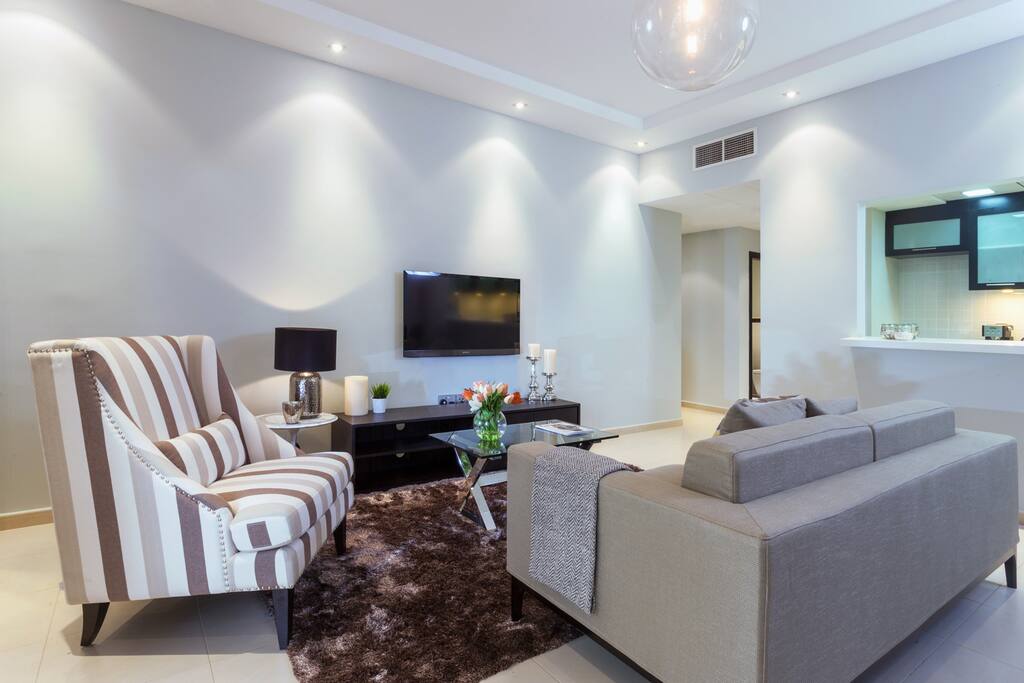Open plan living room with Palm view